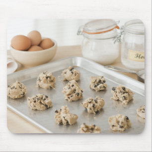 Raw cookies on baking tray mouse pad