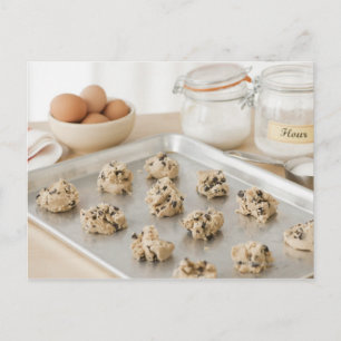 Raw cookies on baking tray postcard