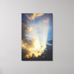 Rays Of Light Shining Through The Clouds Canvas Print