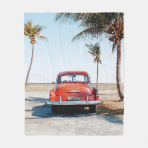 Re beetle beside coconut trees fleece blanket