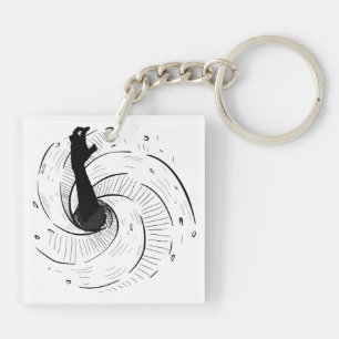 'Reaching to Escape' on a keychain