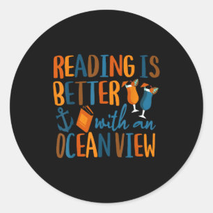 Reading is better with an ocean view classic round sticker