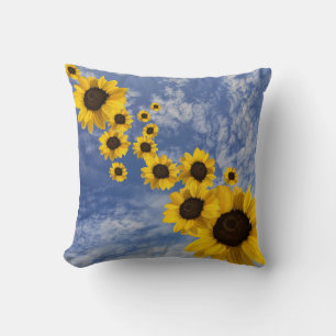 Realistic sunflowers blowing in Cornish sky Cushion