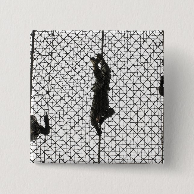 recruits completing an obstacle 15 cm square badge (Front)