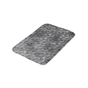 Rectangular forms of grey colour and dark spots bath mat
