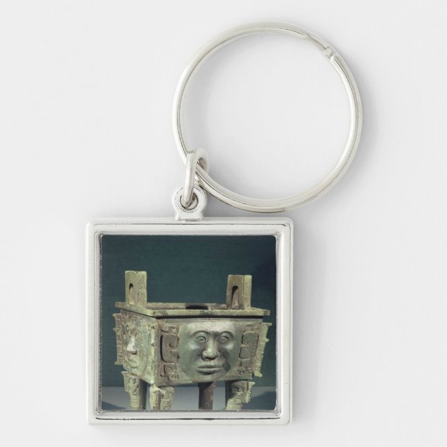 Rectangular 'ting' vessel with human faces key ring (Front)