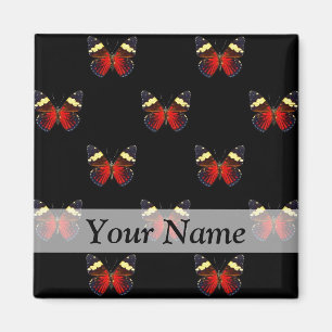 Red and black butterfly pattern magnet