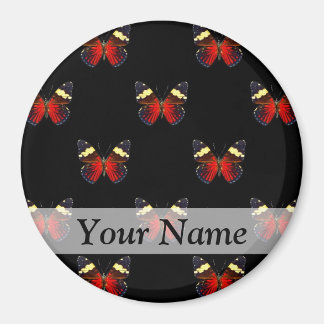 Red and black butterfly pattern magnet