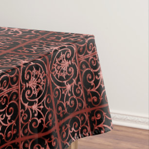 Red and black scrollwork pattern tablecloth