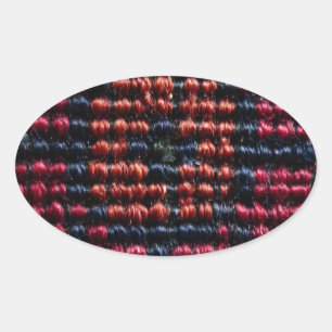 Red and Black Woven Carpet Pattern Oval Sticker