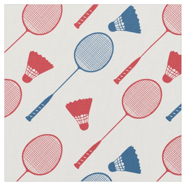 Red and blue badminton rackets on white fabric (Close Up)