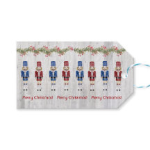 Red and Blue Christmas Nutcrackers On Rustic Barn 