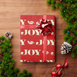 Red and Gold Joy Holly Christmas Wrapping Paper<br><div class="desc">Introducing our Classic Christmas Wrapping Paper, a festive delight designed to bring joy and elegance to your holiday presents. This traditional wrapping paper features a vibrant red background adorned with the word "joy" and delicate holly leaves in shimmering gold, creating a timeless design that captures the true essence of the...</div>