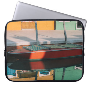 RED AND GREEN BOAT DOCKING ON DOCK LAPTOP SLEEVE