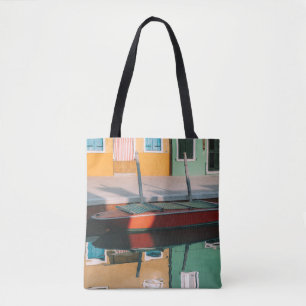 RED AND GREEN BOAT DOCKING ON DOCK TOTE BAG