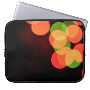Red and green bokeh lights laptop sleeve