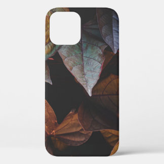 RED AND GREEN LEAVES ON BLACK BACKGROUND iPhone 12 CASE