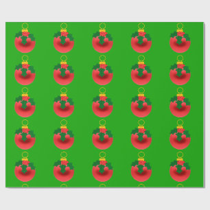 Red and Holly Ornament on Green Wrapping Paper