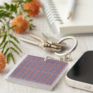 Red and orange paint swirls together, creating a v key ring