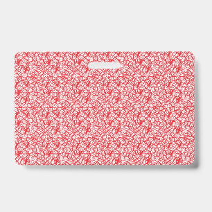 Red and orange wrapping paper with a geometric mot ID badge