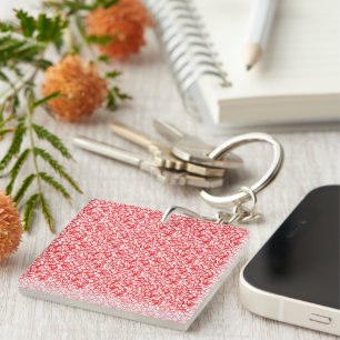 Red and orange wrapping paper with a geometric mot key ring