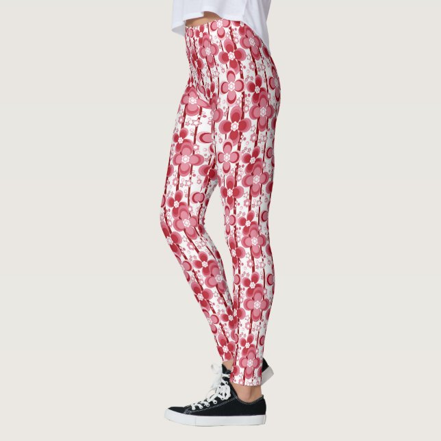 Red and white floral pattern leggings (Left)