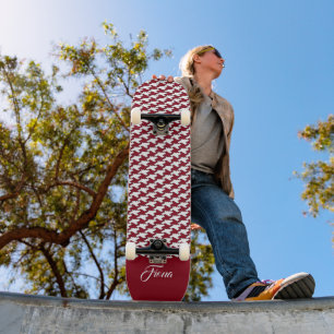 Red and white houndstooth pattern monogram skateboard