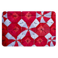 Red and White Open Umbrellas