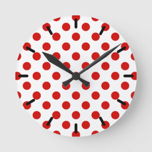 Red and white polka dots round clock