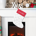 Red and White Snowflake Christmas Custom Small Christmas Stocking<br><div class="desc">Add a timeless touch to your Christmas home decor stocking with this elegant traditional design. Featuring a red and white pattern with silver winter snowflakes, it blends festive Xmas style with traditional snow design for a cosy holiday look. The classic calligraphy script and stylish typography enhance its charm, while the...</div>