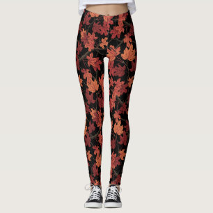 Red Autumn maple leaves on black Leggings