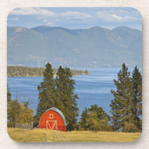 Red barn sits along scenic Flathead Lake near Coaster