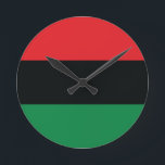 Red, Black and Green Flag Round Clock<br><div class="desc">The 3 Pan-African colors on the flag represent: RED: the blood that unites all people of Black African ancestry, and shed for liberation; BLACK: black people whose existence as a nation, though not a nation-state, is affirmed by the existence of the flag; and GREEN: the abundant natural wealth of Africa....</div>