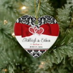 Red, Black, White Damask Love Hearts Wedding Ceramic Tree Decoration<br><div class="desc">This personalised and romantic heart shaped "Our First Christmas" ornament has a black and white damask pattern at the top and bottom with a red ribbon and bow image with joined hearts images across the top. Below the ribbon, the words, "Our First Christmas" are printed in black with the year...</div>