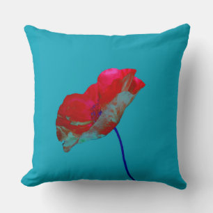 Red blue poppy on bright blue cushion