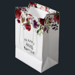Red Blush and Purple Elegant Floral 80th Birthday Medium Gift Bag<br><div class="desc">Part of a coordinating set of birthday party products celebrating an 80th birthday, honour someone special with this lovely watercolor floral birthday gift bag. A beautiful border of stylish roses and mixed flowers along the top of the bag adds feminine style. The text template can be personalised with any age....</div>