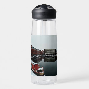 Red boat, at the water bottle