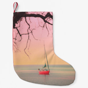 RED BOAT ON BEACH DURING SUNSET SMALL CHRISTMAS STOCKING