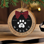 Red Bow Paw Print Memorial Pet Photo Wood Slice Ceramic Tree Decoration<br><div class="desc">Rustic pet memorial photo ornament featuring a rustic faux wood slice background decorated with a buffalo red plaid bow and white paw print. Customize with your pet's name ,  year born,  year passed and monogram. The reverse side features a place to add your pet's photo. Designed by Moodthology Papery</div>