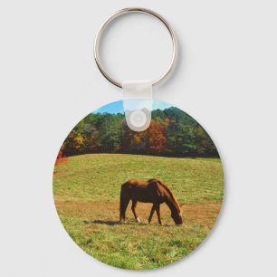 Red Brown horse in the autumn trees Key Ring