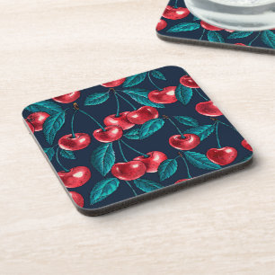 Red cherries on dark blue coaster
