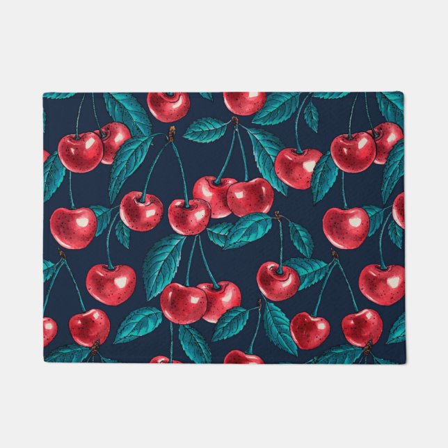 Red cherries on dark blue doormat (Front)