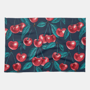 Red cherries on dark blue tea towel