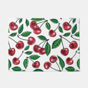 Red cherries on light green gingham doormat