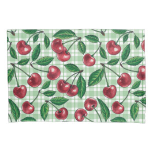 Red cherries on light green gingham pillowcase