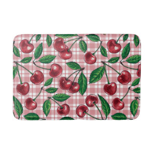 Red cherries on pink gingham bath mat