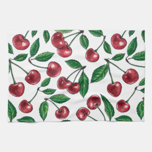 Red cherries on white tea towel