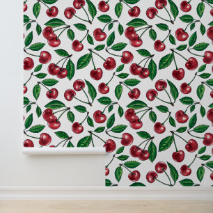 Red cherries on white wallpaper
