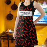 Red Chilli Peppers, Abuela's Kitchen Custom Chef Apron<br><div class="desc">Fun apron featuring red chilli peppers and two lines of custom text. Add a person's name, your Abuela's name, restaurant name, cafe or food truck name or delete the text and rectangle and just use the pattern. Perfect for budding chefs, birthday parties, special events and fiestas, caterers, host/hostess gifts or...</div>