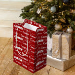 Red Christmas Name Collage Personalised Medium Gift Bag<br><div class="desc">This cute red personalised Christmas gift bag is customised with your name in 9 different beautiful fonts. A cute custom present bag with white typography for holiday gifts.</div>